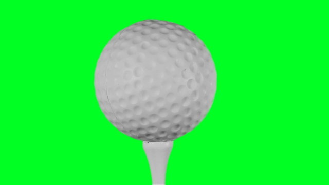 Golf ball on tee agaisnt green screen loop - HD