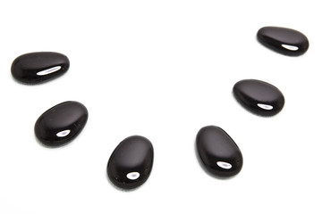 Black Pebbles in Water