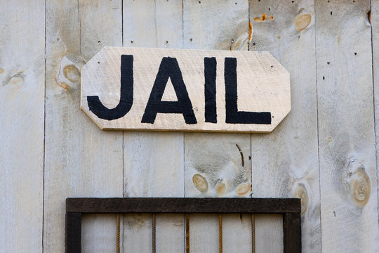 An old-fashioned Western jail sign
