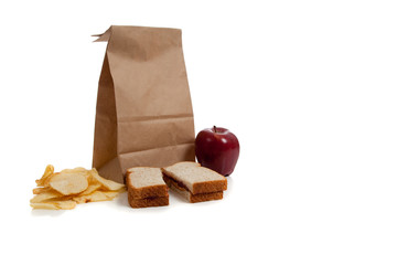 a Sack lunch with peanut butter sandwich