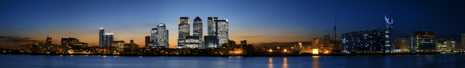 Panorama of the Canary Wharf area at sunset, London.