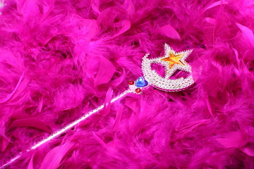 Magic wand on feather scarf