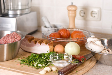 Ingredients for rolled meat with bacon and mushrooms