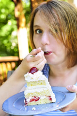 Girl eating a cake