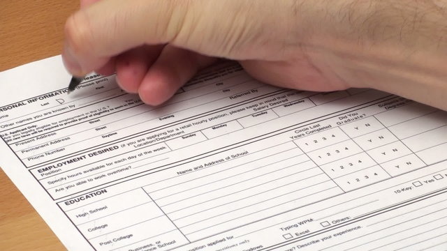 Filling out application for employment - HD