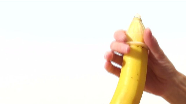 Condom on banana with copy space - HD