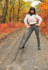 The girl in an autumn forest