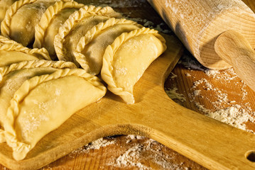 dumplings on the table with flour