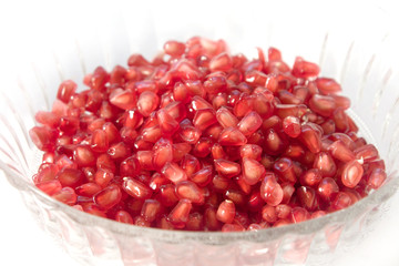 Pomegranate grain in glass bowl
