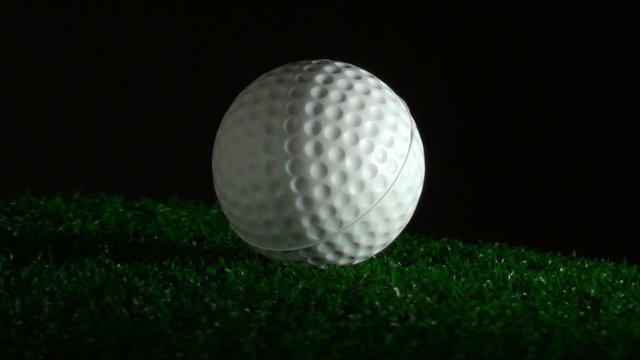 Golf ball on turf wide loop - HD