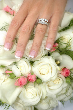 Wedding Ring Finger and Flowers