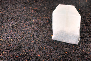 Tea bag and dried tea leaves