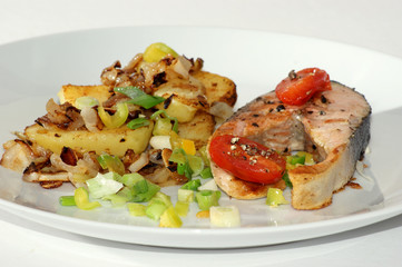 salmon fillet on roasted potato and vegetable