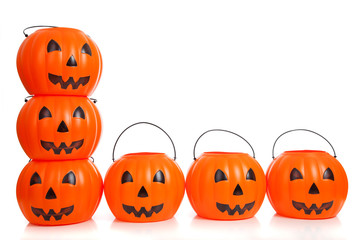 Jack-o-lantern buckets stacked up