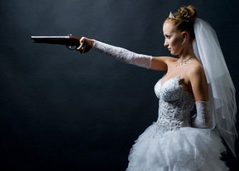 bride holding old gun - Powered by Adobe
