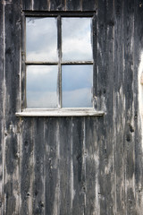 window in wood wall