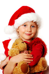 little girl in santa cloth with teddy bear