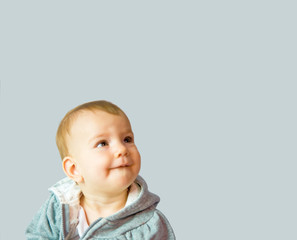 baby looking up at something