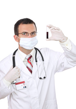 Friendly doctor -hold in hand a medical test glass with blood .