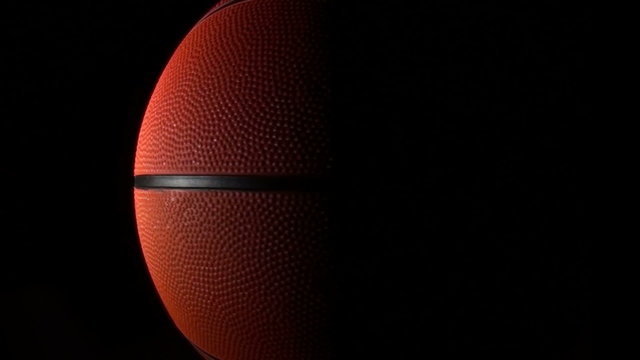 Basketball isolated against black loop - HD