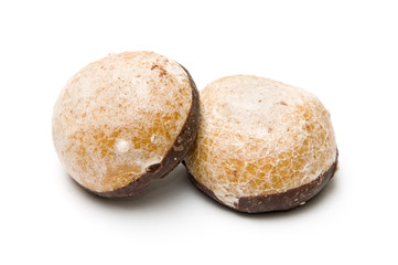 Two honey biscuits piled with chocolate cover