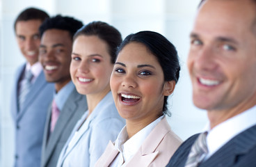 Fototapeta premium Beautiful businesswoman with her team in a line