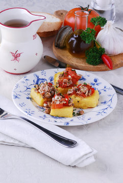 Crostini di polenta gialla con le arselle - Antipasti toscana