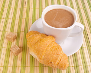 Croissant and cup of coffee