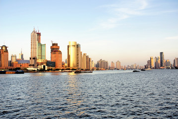Obraz na płótnie Canvas China Shanghai Pudong the Huangpu river riverfront buildings