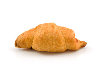 homemade croissant over white background
