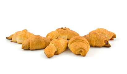 home made croissants over white background