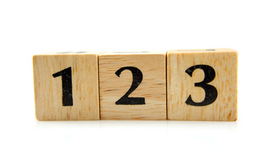 wooden blocks with numbers  1 2 3 over white background