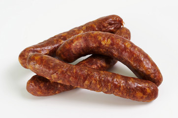 Smoked sausages isolated on white