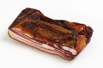 Piece of traditionally prepared smoked pork meat