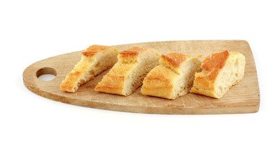 French bread (baguette) on a wooded chop board