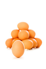 Many eggs on white - shallow depth of field