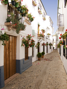 White Washed Cottages With Windowbox Flowers Spain