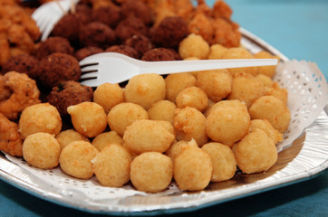 Fried potato balls and meat balls