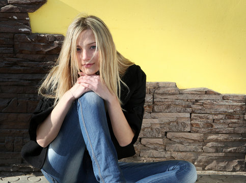 pretti , young cowgirl on yellow wall