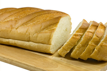 White bread lays on a chopping board