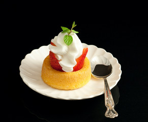 Strawberry shortcake isolated on black