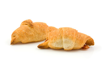 Home made croissants over white background