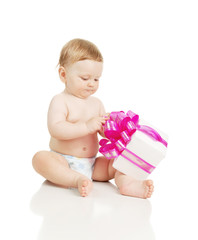 The small baby with a gift in the hands