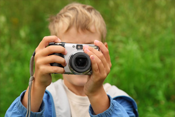 boy photographs outdoor