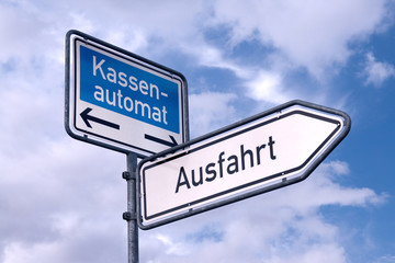 Fototapeta premium Direction signs for pay machine and exit