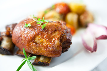 Roast pork with herbs and baked vegetables
