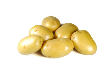 Fresh washed tuber of potato isolated on white