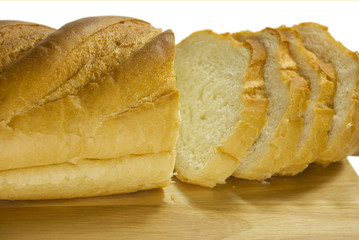 White bread lays on a chopping board