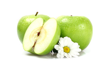 Green apples and flower on white background