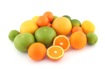 Citrus fruits on white background
